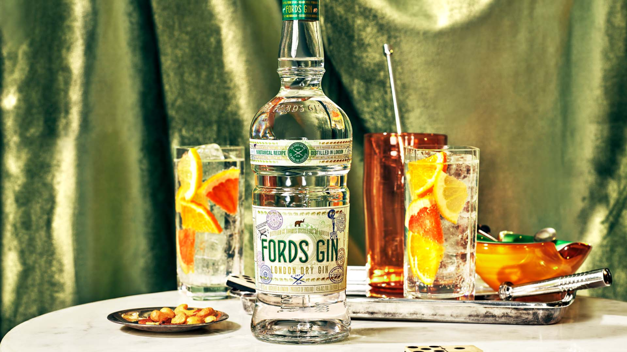 Fords Gin bottle with drinks on table